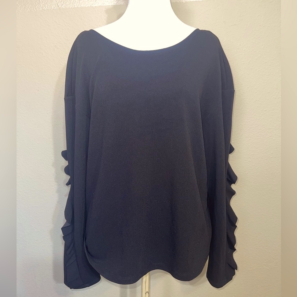 Black Women's long sleeve Top with ruffle detail and deep